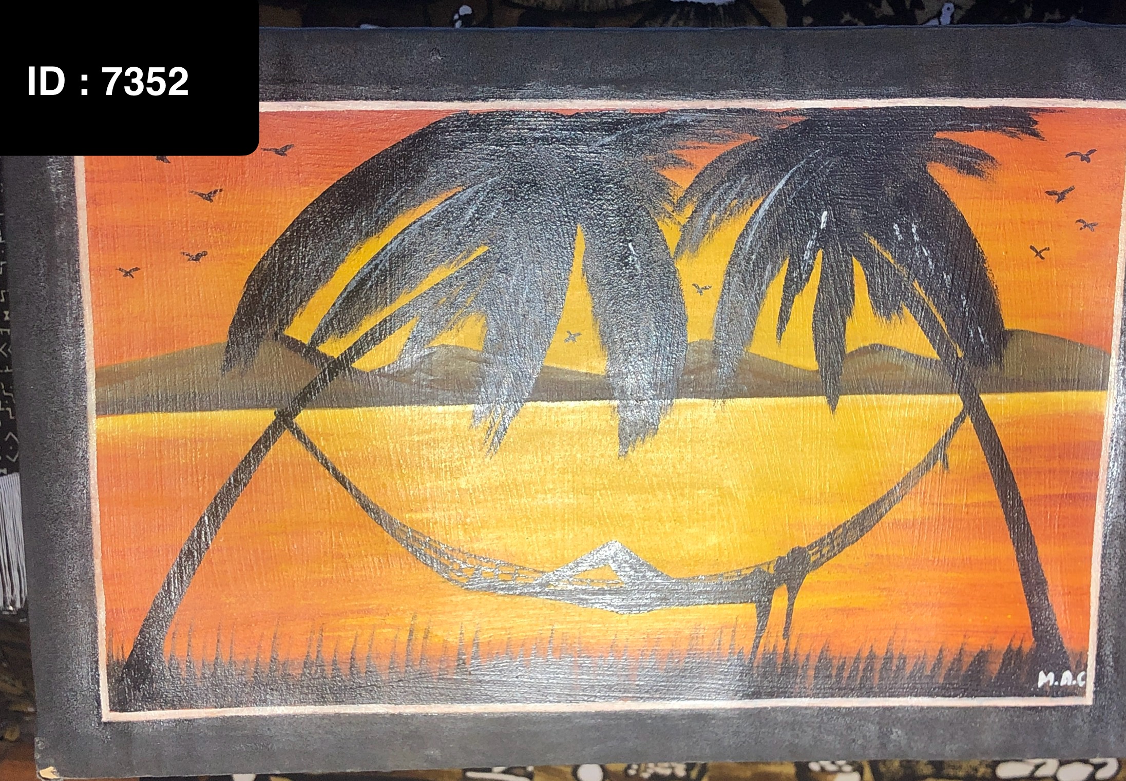 Tablelau pendu sur son perchoir